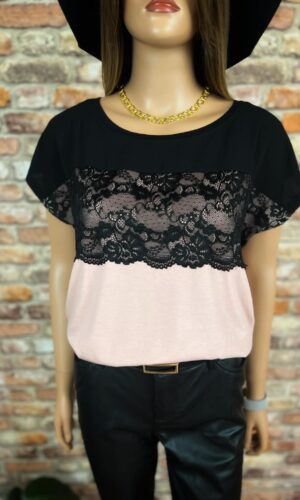 Pudrowa bluzka z czarną koronką przy dekolcie